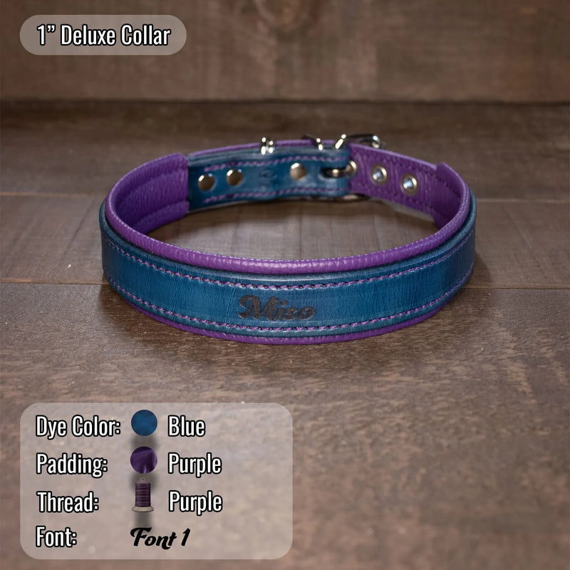 blue leather dog collar with purple padding leather and purple heavy duty stitching.