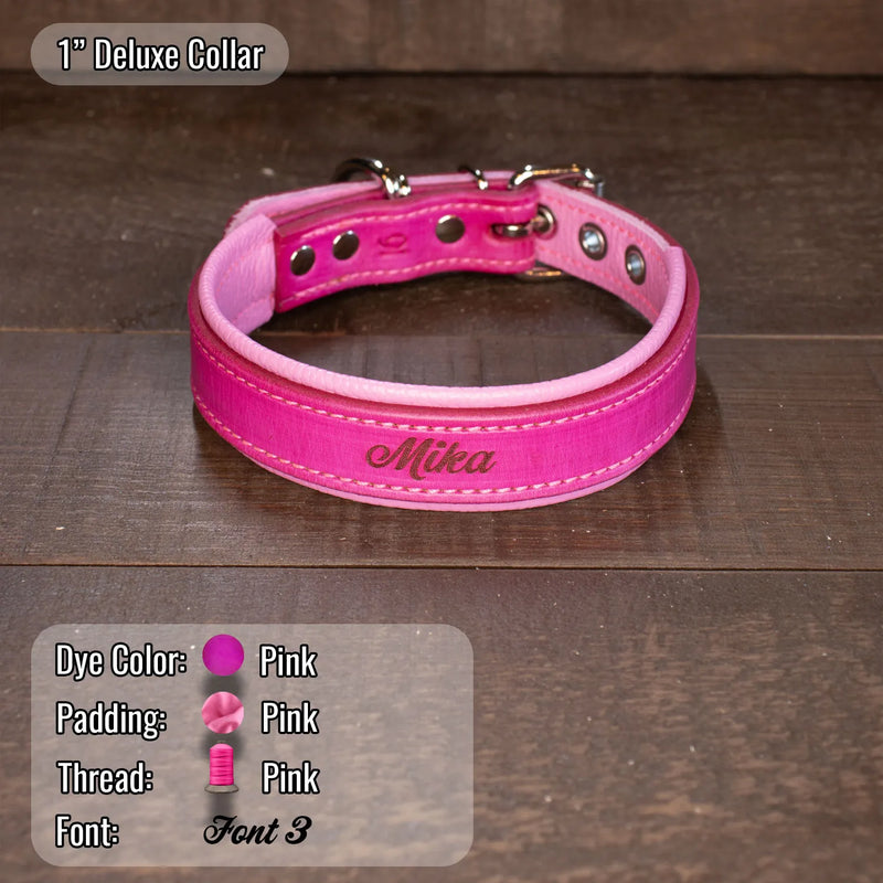 All pink collar with pink padding and pink thread and pink as the main color of the collar with a name etched onto the collar.