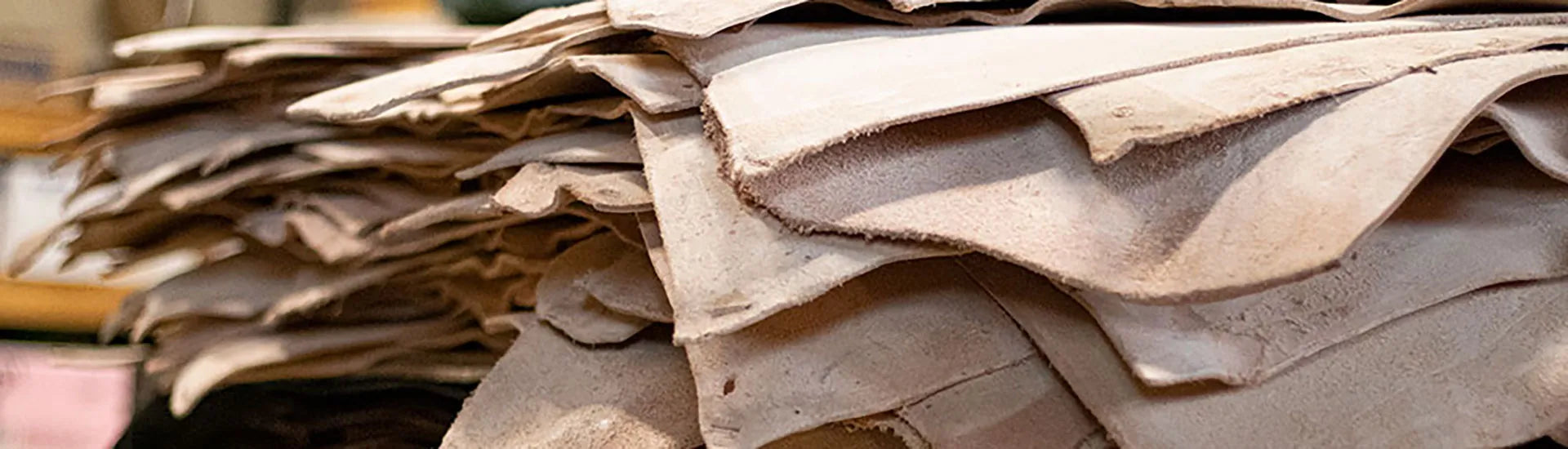 Stack of natural veg tan leather hides