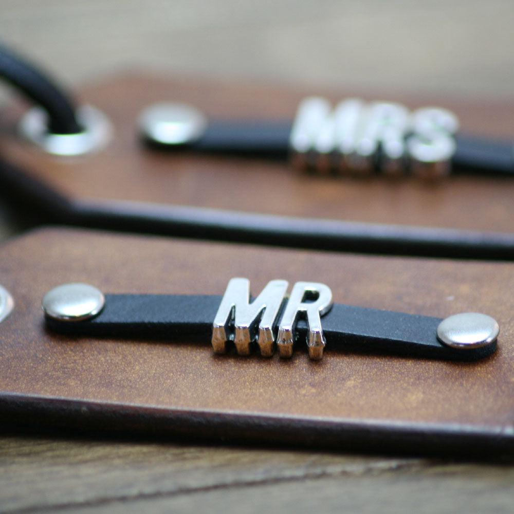Luggage tags with metal font