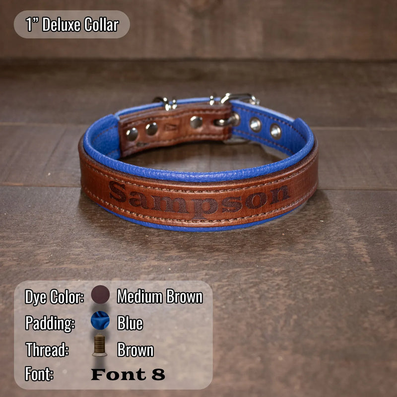 Medium brown with blue padding and dogs name on collar as well as brown thread
