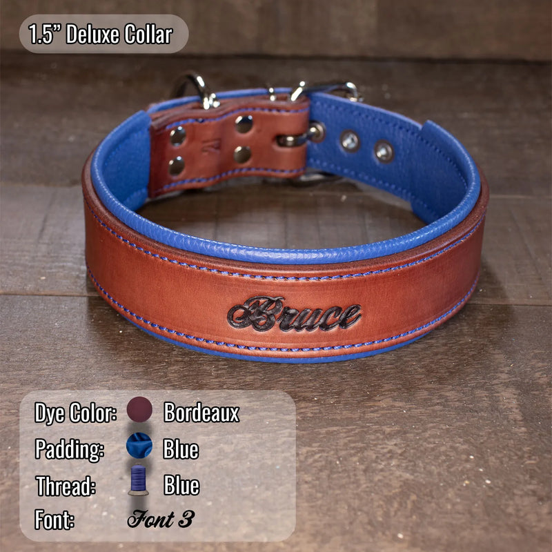 A 1.5" Deluxe collar made of brown leather with blue stitching and blue padded interior, featuring the name 'Bruce' carved by hand and dyed by hand on the front.