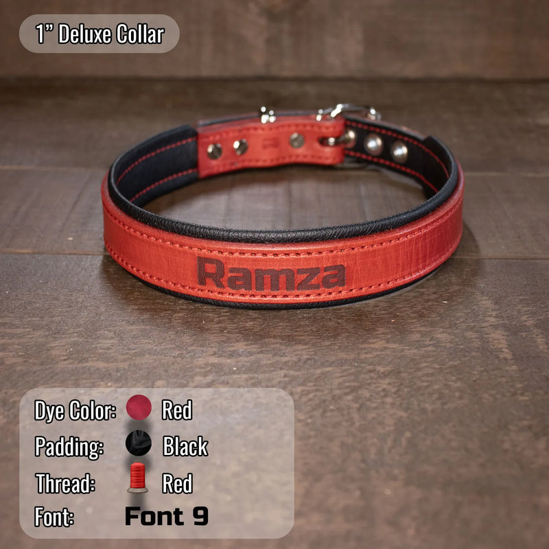 Red collar with Dogs name laser etched on with red thread and black padding.