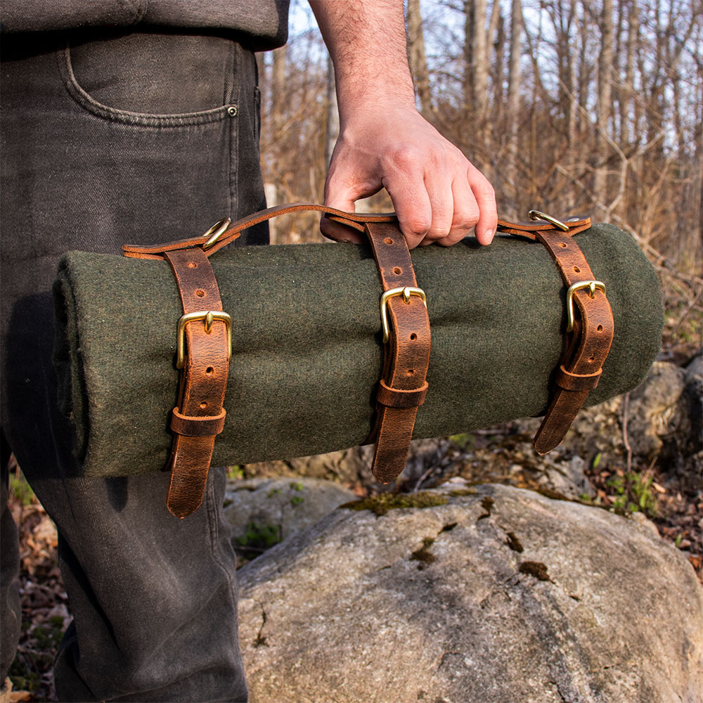 leather straps to hold a blanket roll for camping and backpacking